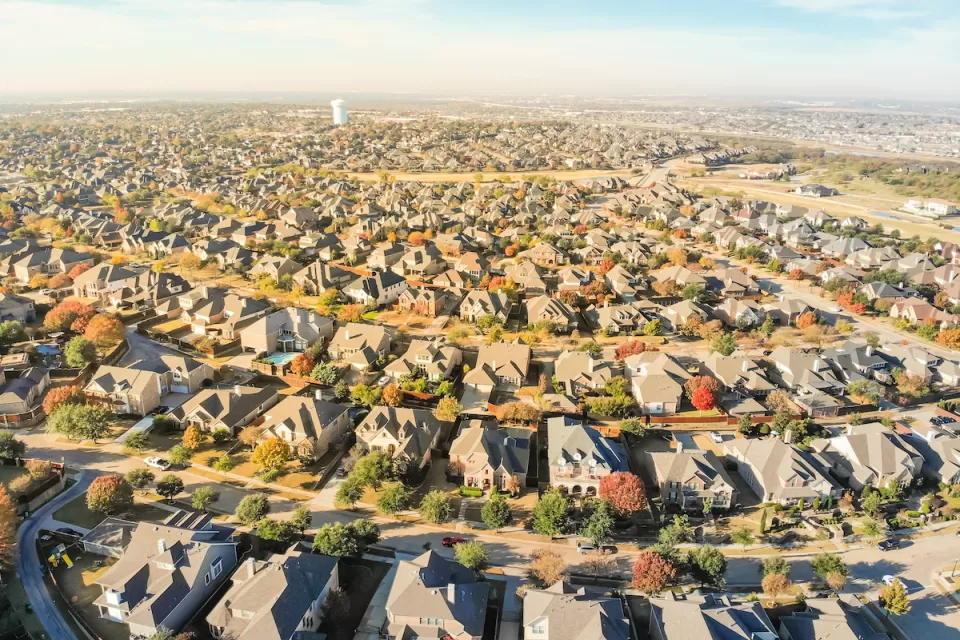 Aerial view of suburban sprawl with large single-family homes near Dallas, Texas.